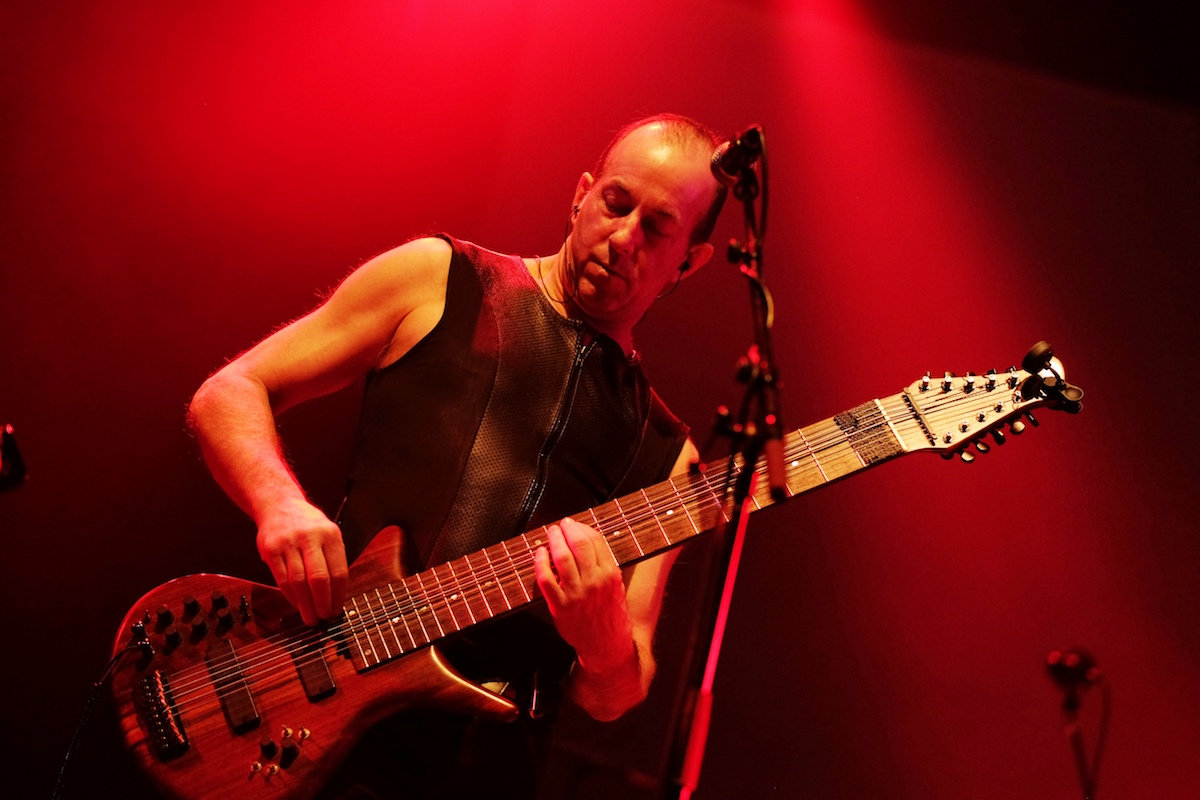 Trey Gunn playing a Warr Guitar in concert